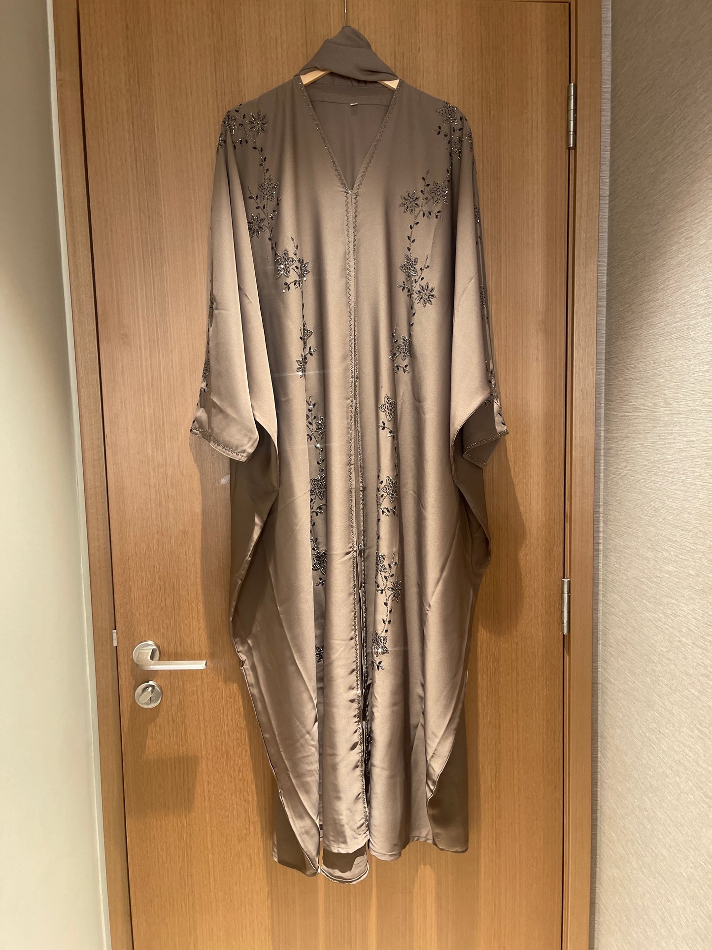 Brown/gold abaya with floral embellishments